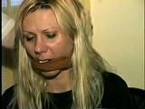 29 Yr OLD SEXY ROMANIAN IS FED A BANANA WHILE TIED TO A CHAIR, TAPE GAGGED & FREE HERSELF BY BITING HER RAWHIDE BONDS (D48-8)
