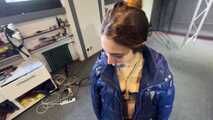 Rey Sanson bound and gagged in a shiny Downcoat