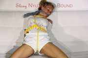 Sexy Sandra being tied and gagged with ropes  and a clothgag wearing a supersexy white/green shiny nylon shorts and a white tshirt (Video)