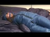 02:45 Min with Alina tied and gagged in a very shiny skisuit
