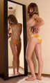 Lynda: topless barefoot girl in only panties, tied with hemp rope, poses on the floor