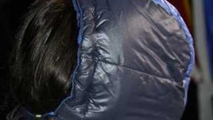 Sexy Mara wearing a black rain pants and a blue/black down jacket being tied, gagged and hooded with tape and clothgag (Pics)