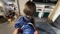 Marie bound and gagged in shiny nylon Rainwear