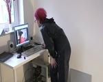Marlin doing PC work wearing a hot rainwear combination (Video)