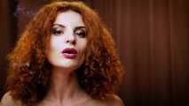 Wild and free girl Yuliya is definitely enjoying a strong 100mm black cigarette