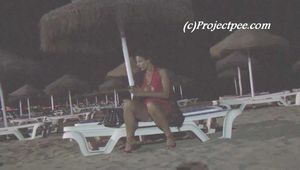 016231 Eve Takes A Pee On The Sands At Sunset