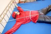 A nice cuty hooded, tied and gagged on bed