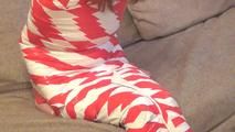 [From archive] Stella - wrapped in red and white duct tape (video)