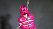 Rachel Adams bound, Pantygagged and Pantyhooded in a shiny nylon Downjacket