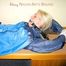 Archive girl tied and gagged with tape and rope wearing shiny nylon rainwear in blue (Pics)