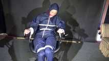 Watching Sonja sitting on a hairdresser`s chair wearing sexy blue shiny nylon rainwear with a raincape being tied, gagged and hooded with ropes and a clothgag (Video)