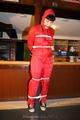 Jill bound in a red nylon rainsuit