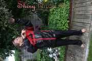 Watching sexy Sandra wearing a oldschool black/red shiny nylon rainwear combination while gardening outside (Pics)