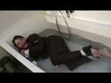 Watch Maggy beeing bound and gagged in a bathtube wearing a shiny nylon Skisuit from our Archives 2012