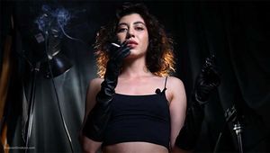Great smoker Anastasia is smoking two all white cigarettes in a leather  gloves