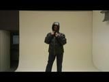 Stella posing infront of the camera wearing supersexy black rainwear and highheels (Video)