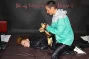 Part 2 of Stella overpowering intruder Ronja both wearing shiny nylon!