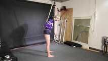 Myxxxy tied and gagged in shiny nylon Shorts and Windbreaker