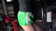 Watching sexy Sandra during her workout wearing a sexy green shiny nylon shorts and a black top (Video)