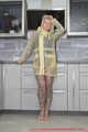 Miss Francine in yellow Schmuddelwedda raincoat