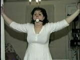 BALL-GAGGED, & TIED BETWEEN  2 PILLARS DAMSEL (D16-12)