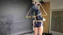 Marie bound, gagged and spanked in shiny nylon Shorts and a Windbreaker