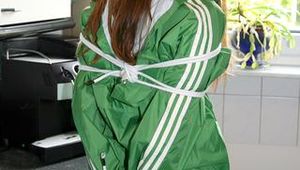 Stella tied and gagged in shiny nylon shorts