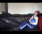 SEXY LUCY preparing her sofa for lolling wearing a sexy shiny nylon rainwear combination (Video9