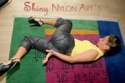 Stella posing in a living room wearing supersexy rainwear (Pics)