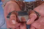 Hinged handcuffs