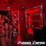 Rubber Sissy is trained to suck the first real cock.