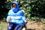 Julia tied and gagged in a shiny nylon downjacket