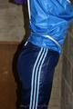 Alina tied and gagged in shiny nylon clothes