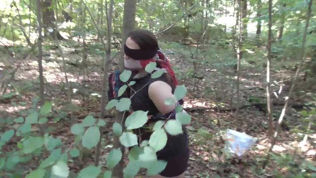 Ivana toweltied to tree 2/2