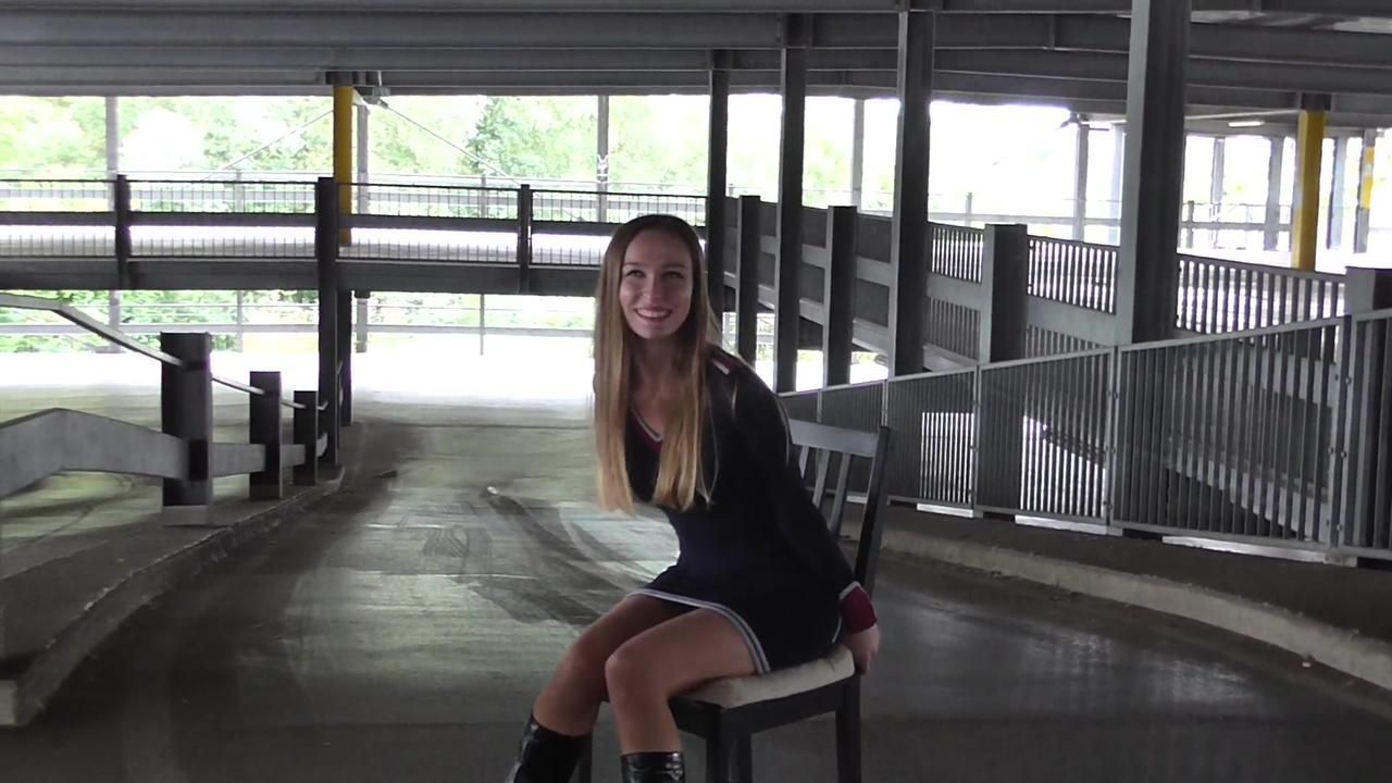 Stella on chair at car park 1/2