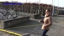 078014 Rachel Evans Pees Beside Her Car