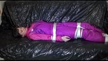 Mara tied and gagged on a sofa wearing sexy pink/purple downwear (Video)