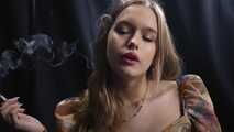 Subtle grace and cigarette smoke: irresistible confidence