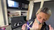 Myxxxy tied and gagged in shiny nylon Shorts and Windbreaker