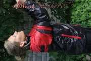 Watching sexy Sandra wearing a oldschool black/red shiny nylon rainwear combination while gardening outside (Pics)