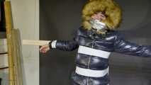 Lana tied and gagged in a shiny nylon Downjacket