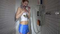 SEXY SANDRA in the shower with a sexy lightblue shiny nylon shorts and a top (Video)
