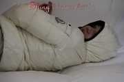 SEXY Jill wearing a WHITE rain pants and a WHITE down jacket lolling on the sofa playing with you (Pics)
