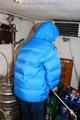Jill tied and gagged in a down jacket