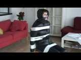 Get 2 Videos with Dani bound and gagged in shiny nylon Downwear from 2008.