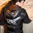 Jill tied and gagged in a black downjacket and rainpants