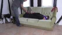 Vanessa hogtie on couch 1/2