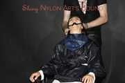 Watching our new model "AIYANA" wearing sexy shiny nylon rainwear being bound with tape, gagged with a ballgag, dominated and hooded from Dark Temptation (Pics)