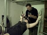 Sandra tied on a gym 1/2