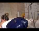Watching Sandra wearing a sexy blue shiny nylon shorts and a top while playing with water in her bath tub (Video)